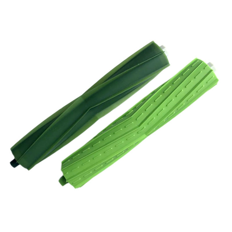 Pair of green robot main sweep brushes with bristle blades, side view.