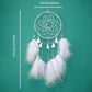 Green hoop dream catcher wall hanging with white feather fringe and dangling tassels, measured size shown