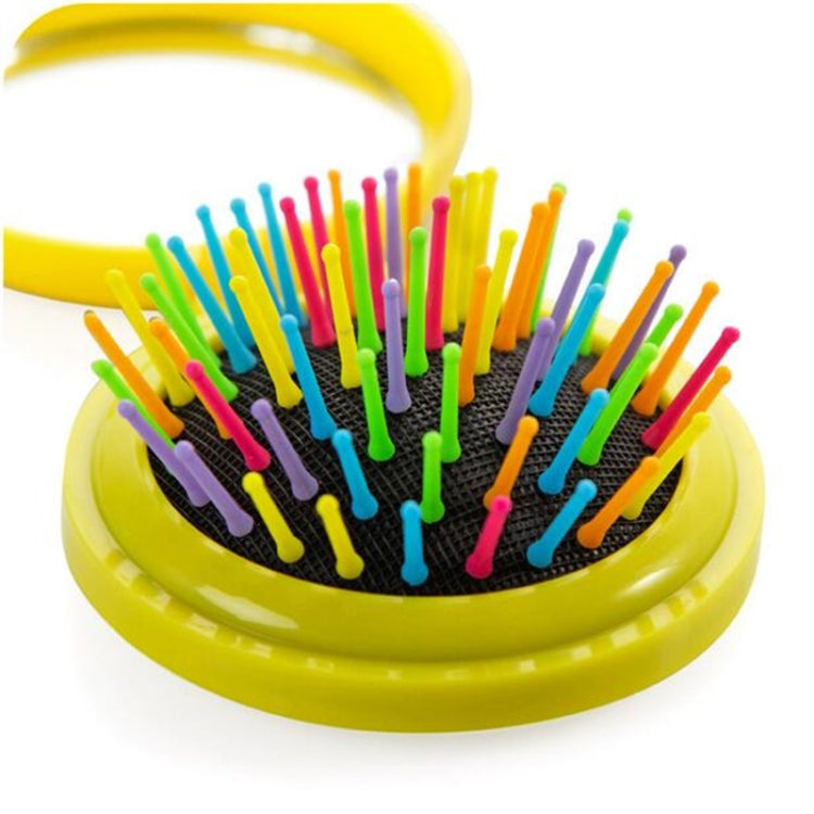 Yellow folding massage mirror comb with rainbow bristle pins and round compact base