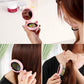 Pink folding massage mirror comb shown in use with colorful bristle brush and mirror