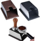 Brown silicone espresso tamper stand with stainless sides and handle cup