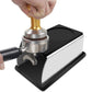 Stainless and black espresso tamper stand with wooden-handled tamper