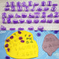 Purple cookie letter and number molds pressed into fondant dough