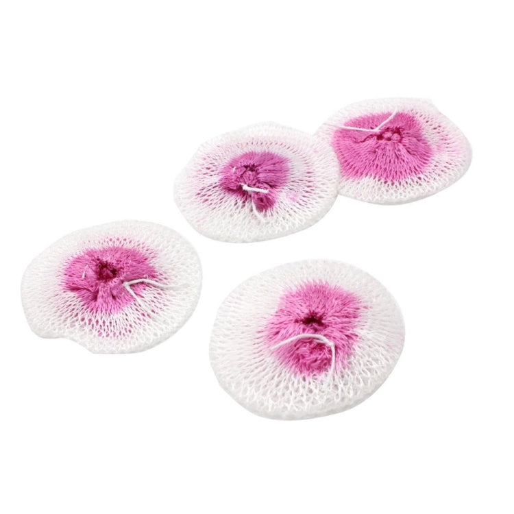 Four round mesh gauze pads with white edges and pink puffed centers