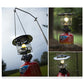 Camping gas lantern with fitted lamp top and glowing flame