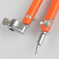 Close-up of orange circle compass with stainless clamps and pointed tip