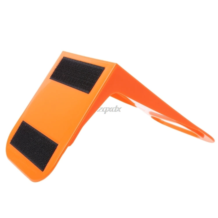 Orange plastic trunk partition baffle bracket with two black grip pads