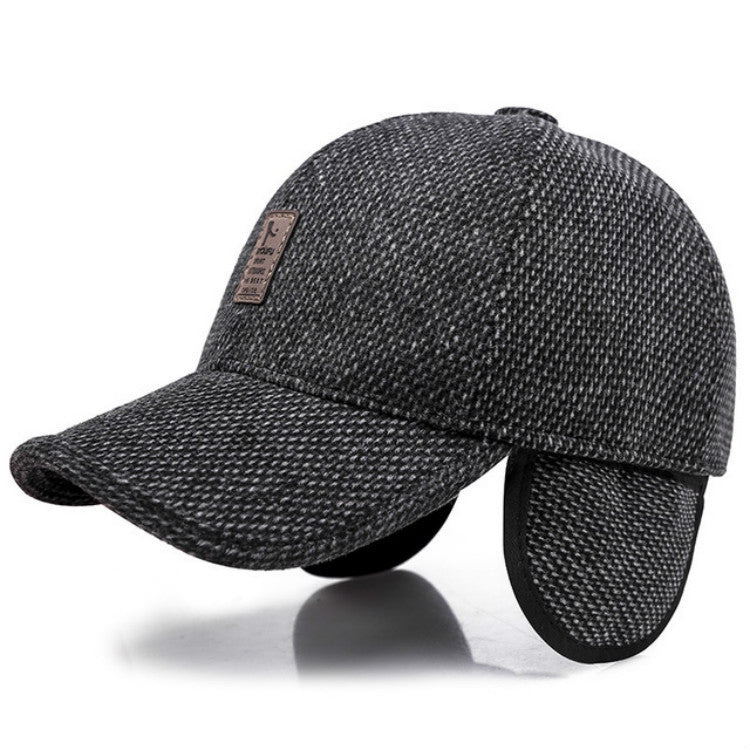 Dark gray warm baseball cap with curved brim and padded ear flaps, leather logo patch