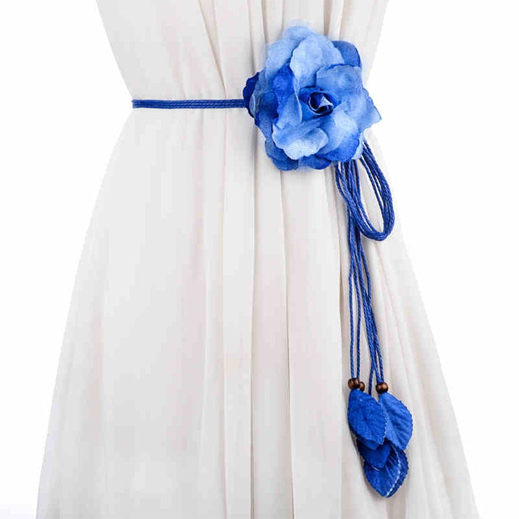 Blue flower belt with trailing cord and layered leaf tassel charms