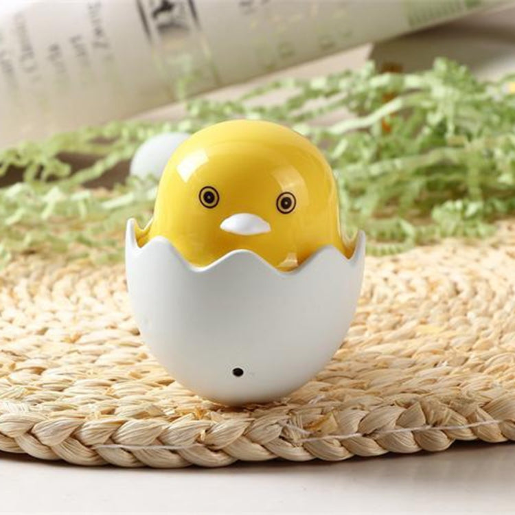 Yellow duck LED night light in white egg shell, wall-plug night lamp