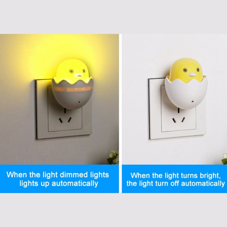 Duck egg wall night light with light-control sensor, mounted on power outlet