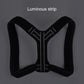 Black posture corrector back brace with luminous stitched lines along center support