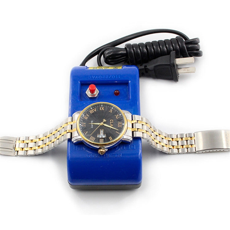 Blue mechanical watch demagnetizer tool with cable and plug, holding a wristwatch