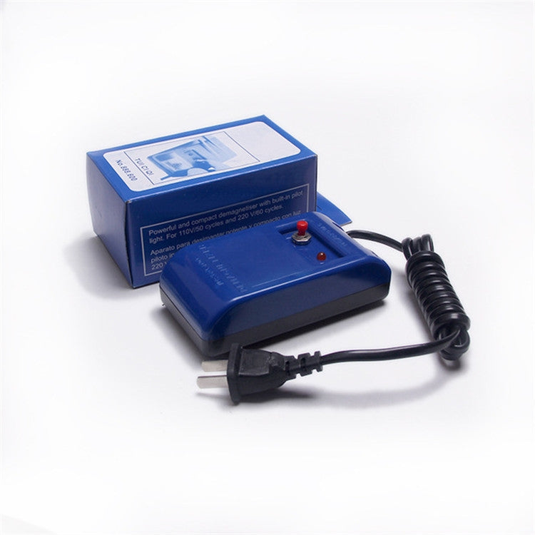 Blue watch demagnetizer tool with coiled cord, AC plug, and product box