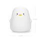 White penguin-shaped silicone night light on plain background with size markings.