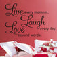 Removable wall decal cursive quote 'Live, Laugh, Love' with black butterflies