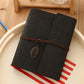 Black PU leather vintage photo album with embossed leaf pattern, twine tie, and leaf charm.