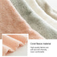 Pink coral-toned microfiber towel fabric close-up with dense fleece pile