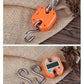 Orange mini digital hook scale with two metal hooks on a flat surface