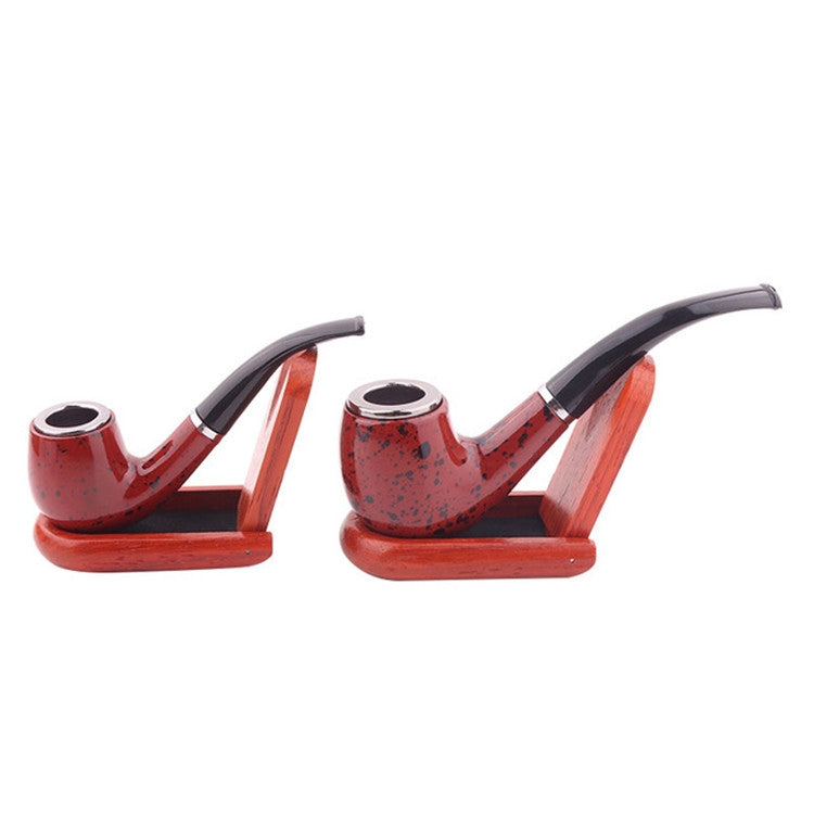 Two red speckled mini resin smoking pipes with black mouthpieces