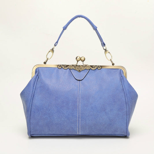 Blue retro kiss-lock shoulder bag with top handle and gold-tone clasp frame