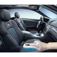Handheld UV sterilizer wand with blue light near car seats