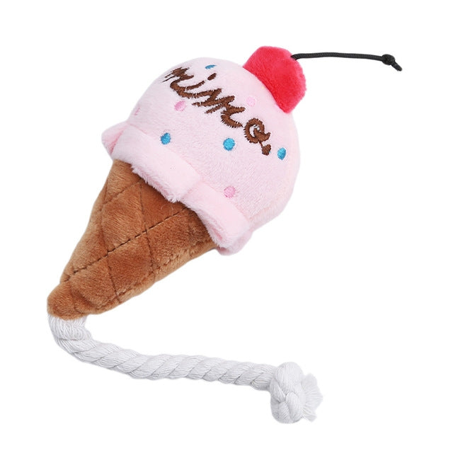 Pink plush ice cream cone squeaky pet toy with white rope arms and red cherry