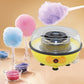 Mini electric cotton candy machine with colorful cotton candy on sticks and bowls
