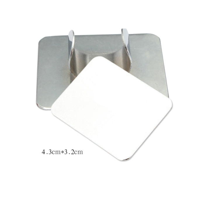 Stainless steel holder with small square white mixing plate for creams