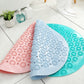 Round massage foot mat with raised suction bumps, shown in blue, teal, and pink sections