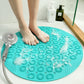 Teal round anti-slip massage foot mat with raised suction bumps for shower use