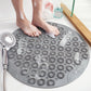 Gray round anti-slip massage foot mat with raised suction bumps for shower floors