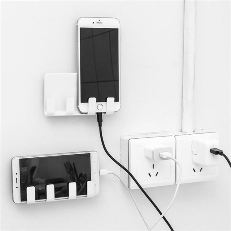 White wall-mounted phone charging holder with adhesive backing and two charging slots