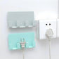 Mint and white wall charging holder set with phone slots and outlet cable mount