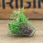 Artificial handmade model flower bush with green leaves and small pink blossoms