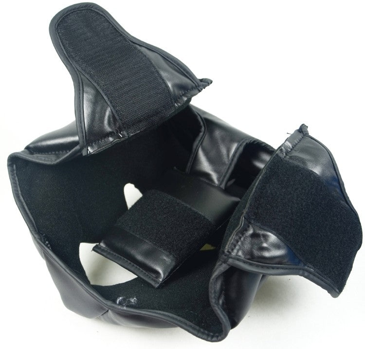 Black adjustable adult boxing training helmet with inner straps and padded ear guards