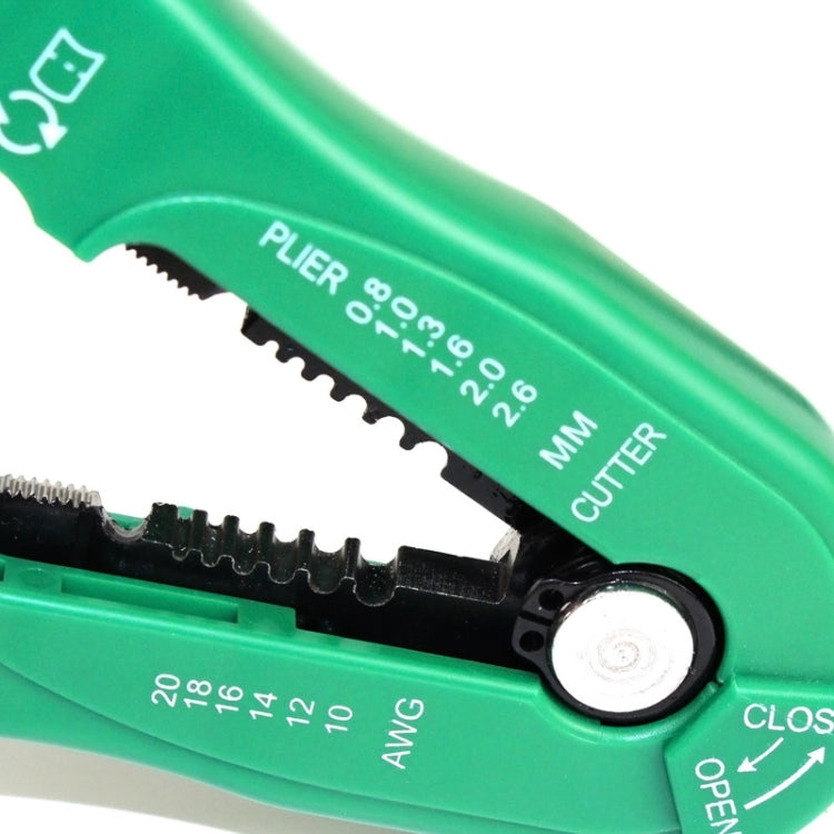 Green wire stripper blade section with AWG and mm size scale