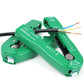 Green manual wire stripper tool with open jaws holding multi-core cable