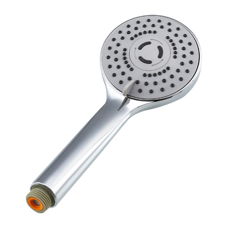 Round handheld shower head with spray nozzles and hose connection