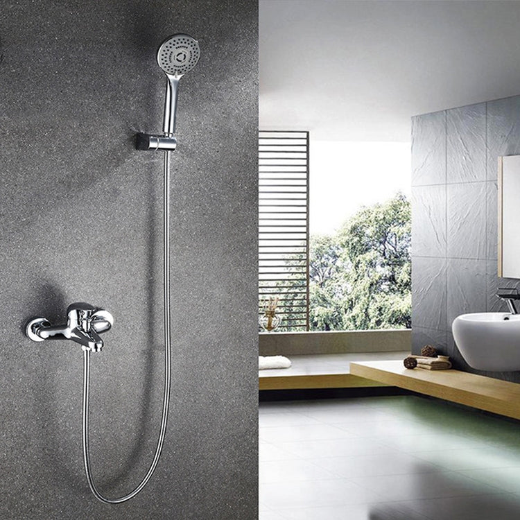 Compact shower set with wall-mounted mixer and handheld shower on flexible hose
