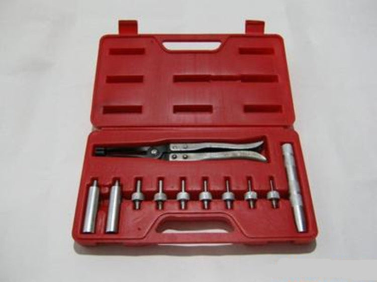 Valve stem seal tool set in open red case with pliers and metal tool shafts