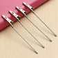 Four metal wire rope alligator clips with twisted cable and latch jaws