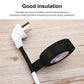 Black vinyl electrical insulating tape applied to a power plug on a wooden surface