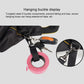 Black tool bag with hanging buckle hardware, metal ring, and strap loops