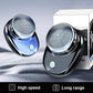 Portable electric shaver with round foil head, shown with a second unit.