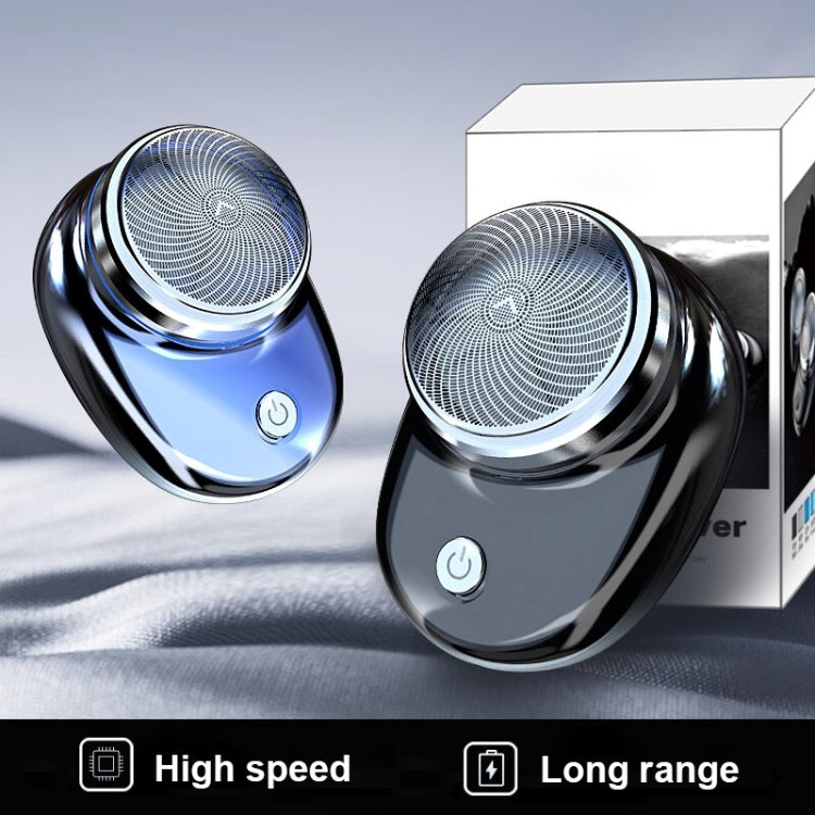 Portable electric shaver with round foil head, shown with a second unit.