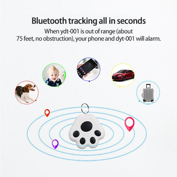 White paw-shaped pet GPS tracker keychain with black paw pads, shown with signal waves