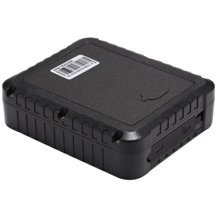 Black GPS vehicle tracker back view with barcode label and mounting holes