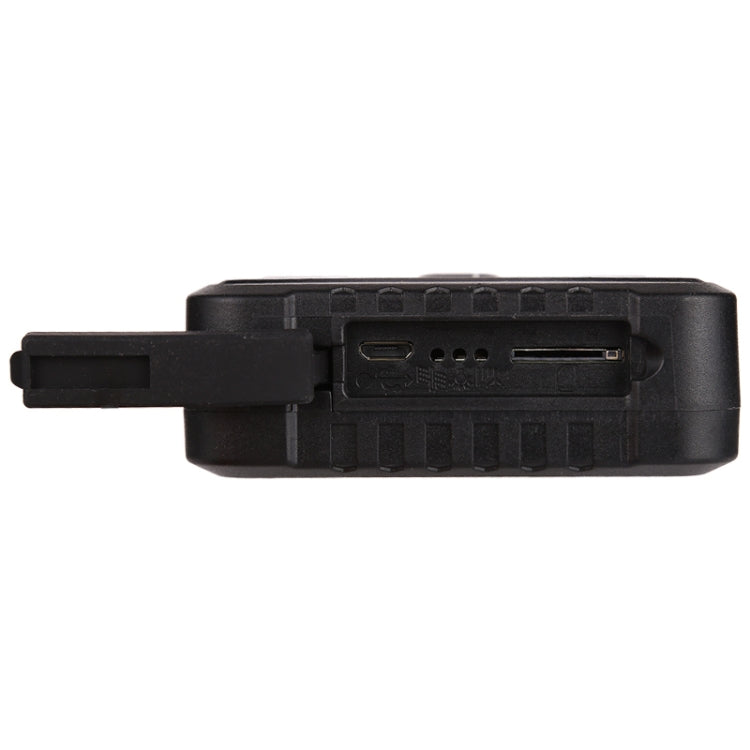 Black GPS vehicle tracker side view with port opening