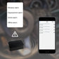 Black GPS tracker with smartphone app showing alarm notifications